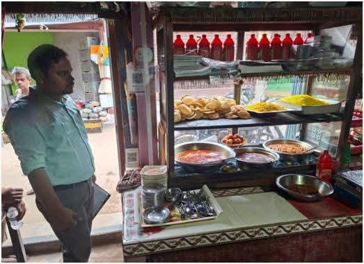 Food Safety Officer Inspects Eaterie