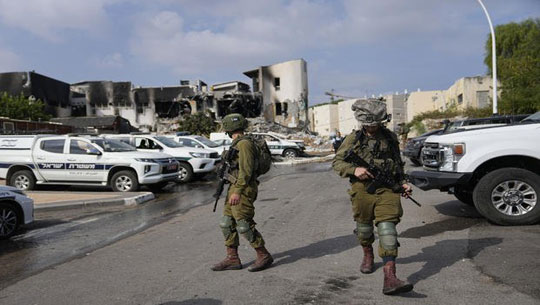 Israeli forces battle Hamas militants across Gaza
