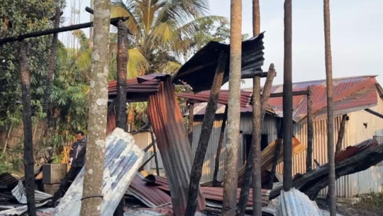 Massive Fire Ravages Shop and Three 